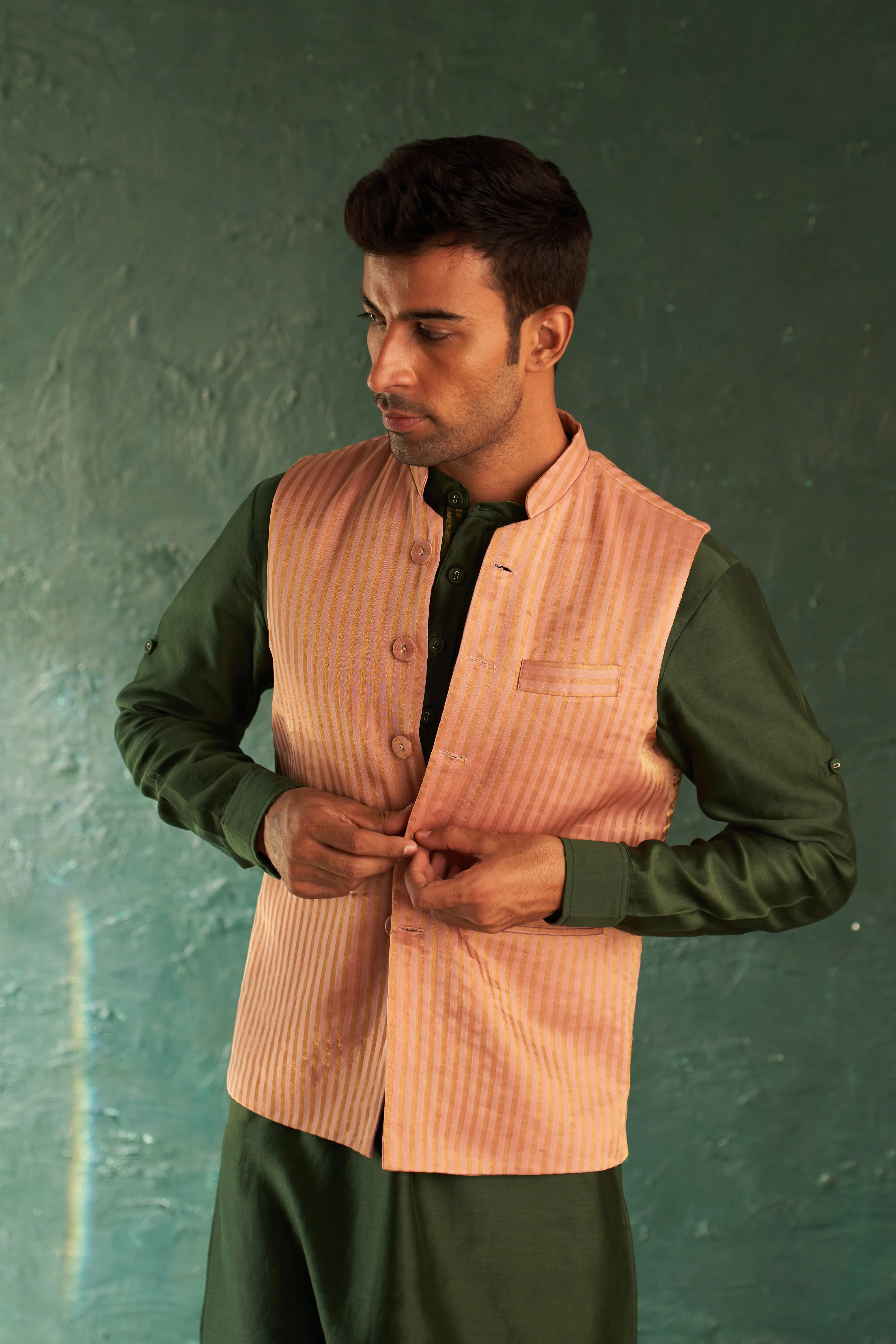 Green straight kurta and pink nehru jacket set