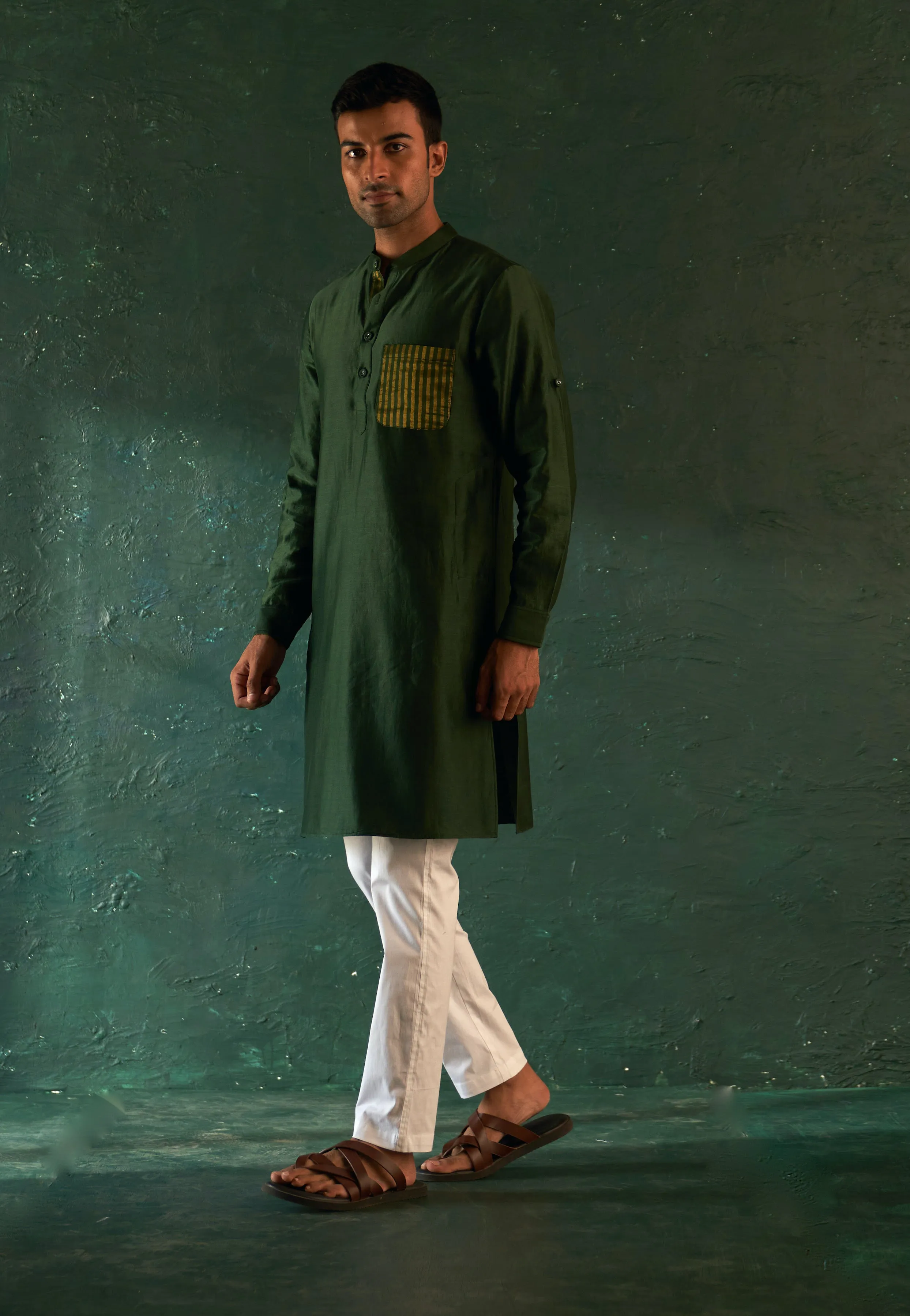 Green straight kurta and pink nehru jacket set
