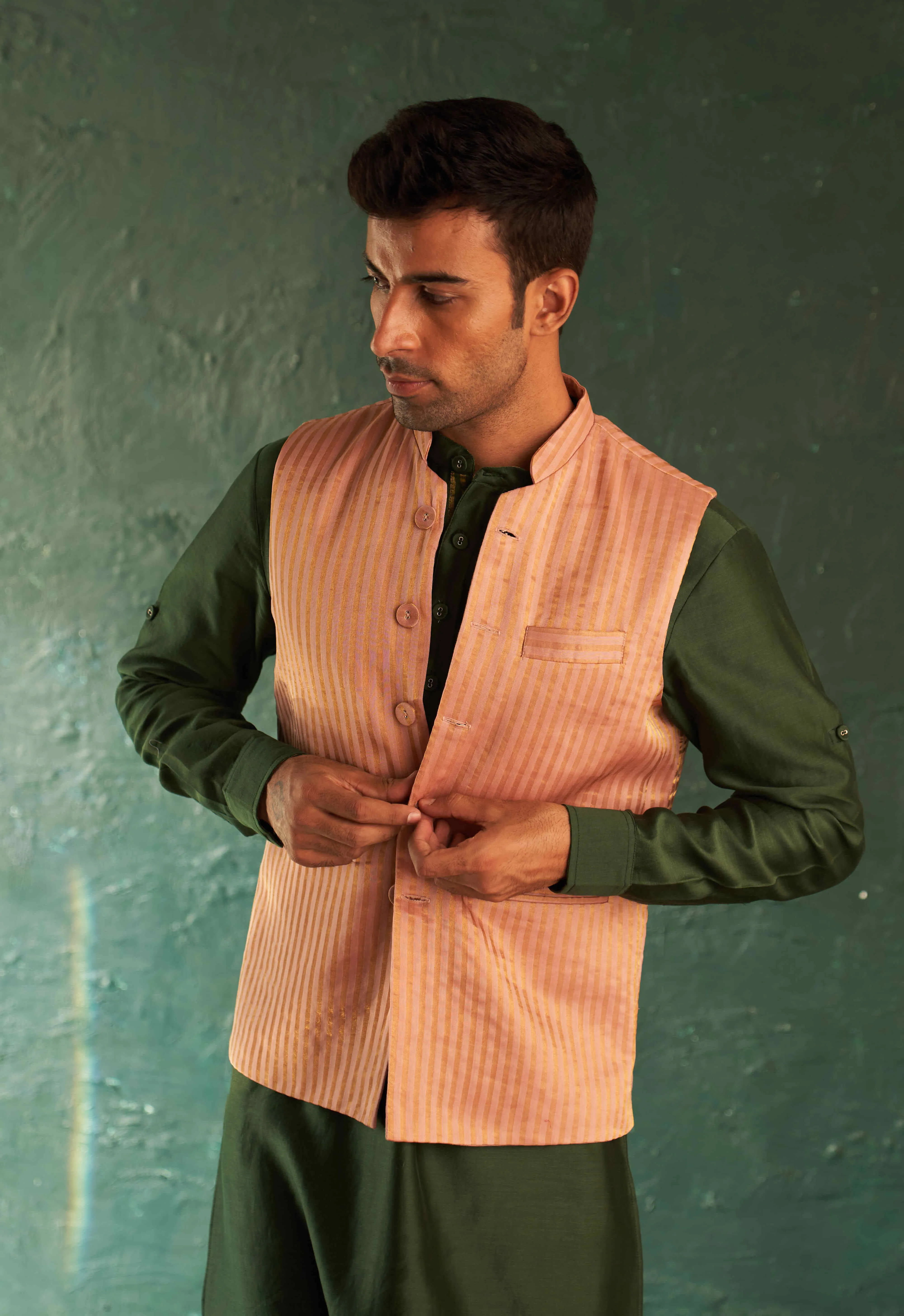 Green straight kurta and pink nehru jacket set